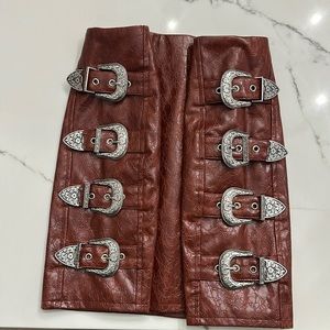 Faux leather skirt with buckle detail